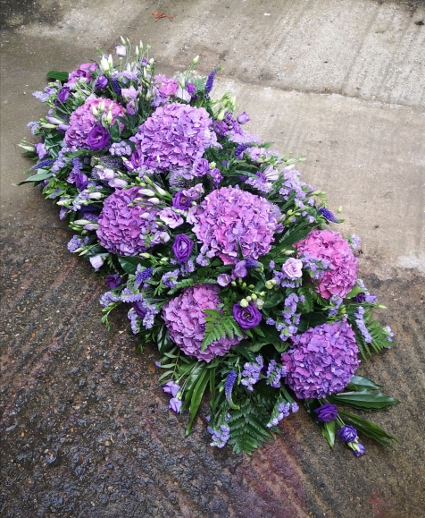 luxury hydrangeas coffin spray  made by florist in Bromley