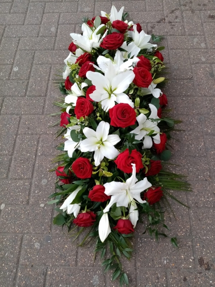 Rose and Lily Coffin Spray made by funeral florist in Bromley