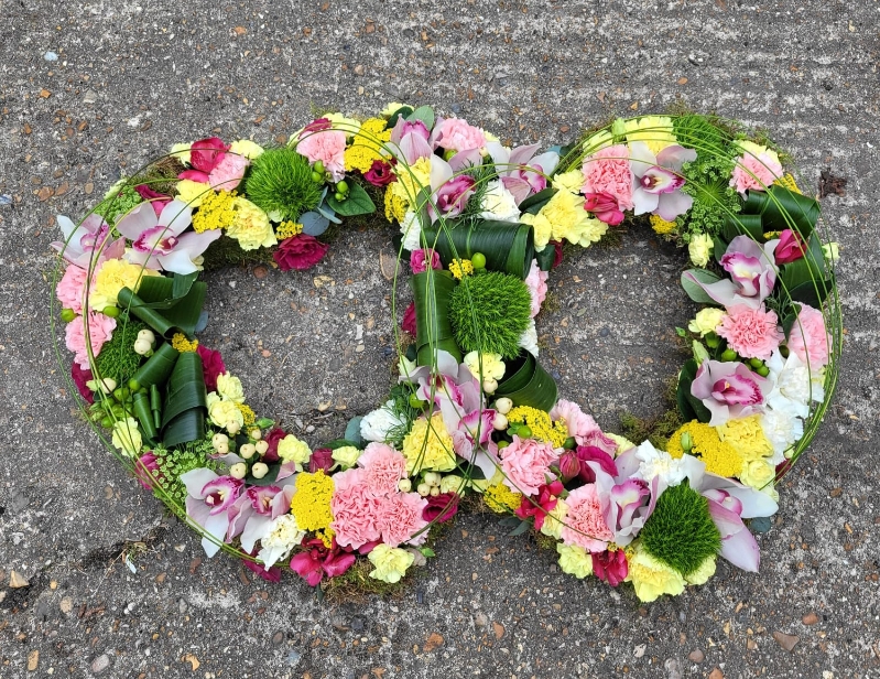 Yellow double funeral heart by Blooms and Candy