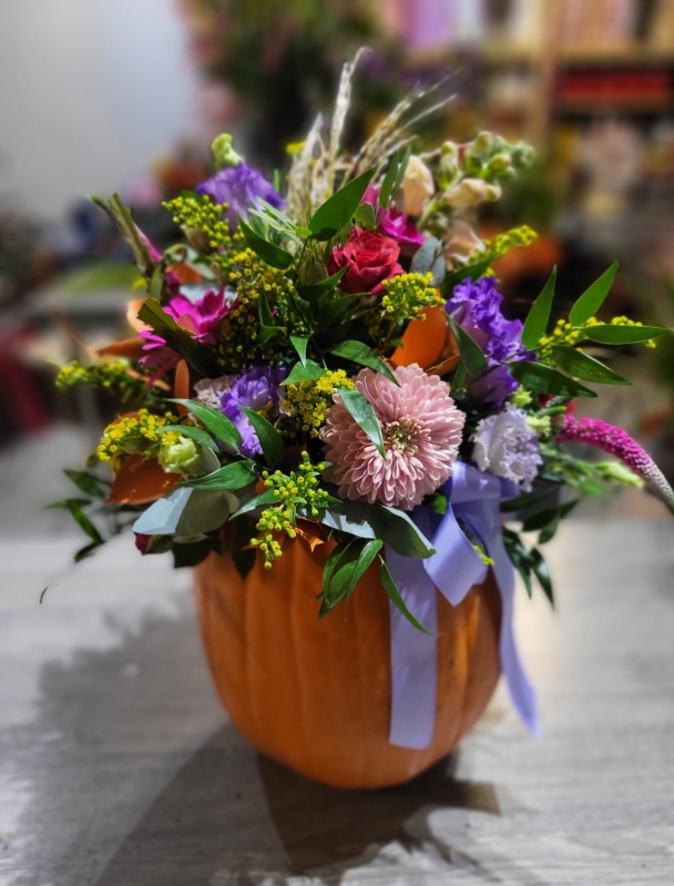 Florist pumpkin arrangement made with fresh flowers and foliages by florist in Bromley, Kent, UK for delivery in South London and BR postcodes