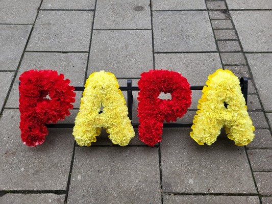 Carnations based funeral lettering by florist in Hayes, Bromley, Kent