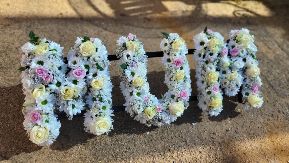 Mixed flowers funeral letters from Bromley Florist 