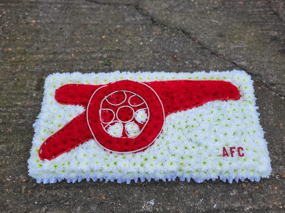 Arsenal Cannon funeral flowers by Blooms and Candy