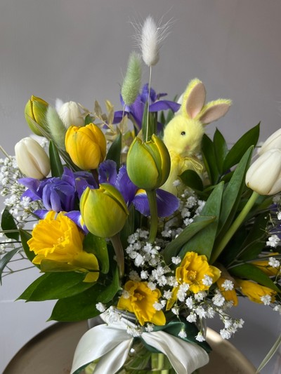 Yellow double tulips and iris and pussy willow vase. With hanging bunny decoration.  Lovely spring gift.  vase included. Made by florist near me in Bromley for same day delivery in BR2 BR1 BR3 BR4 BR5 BR6 BR7 BR8 CR09 CR06 SE25 SE12 SE6 SE3