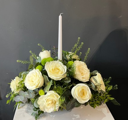 White roses candle table centerpiece made by florist in Hayes, Bromley, Kent, UK