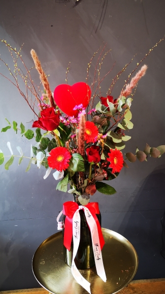 Amazing fresh flowers mider vase to include red roses, eucalyptus, large pik arranged by florist in Bromley, BR, Kent for Valentine's heart