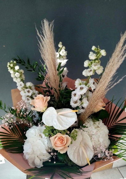 all white bouquet to include anthurium and delphiniums and pampass grass available for same day delivery in Bromley, Hayes, Beckenham, Keston, West Wickham