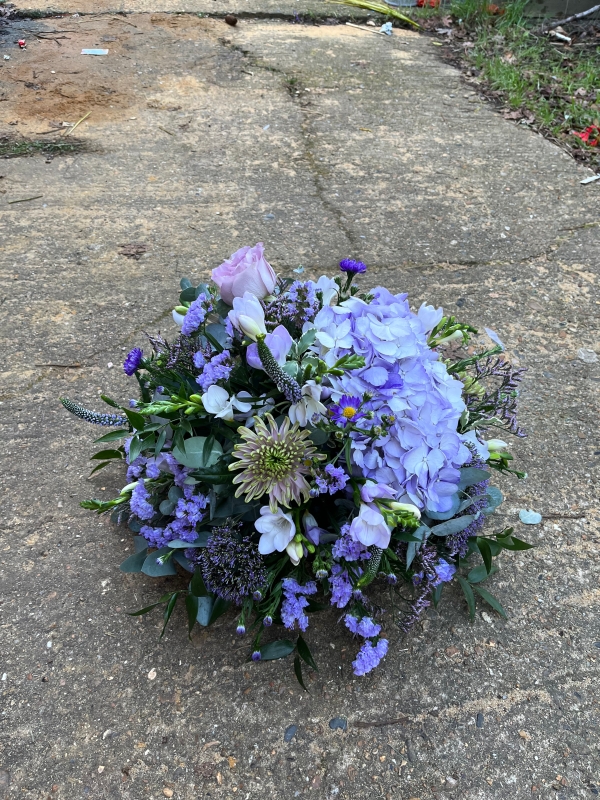 Stunning garden style lilacs and purples seasonal flowers posy made of best blooms. By florist in Bromley BR