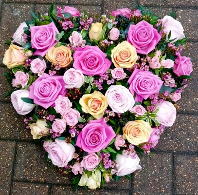 Pastels solid funeral heart made by florist in Bromley, funeral flowers in South London