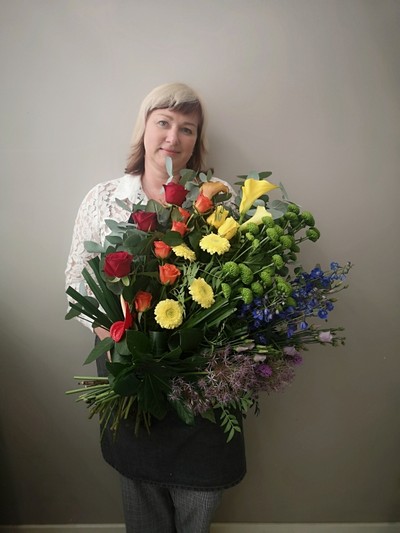 Rainbow funerals flowers arranged by florist in Croydon, Surrey