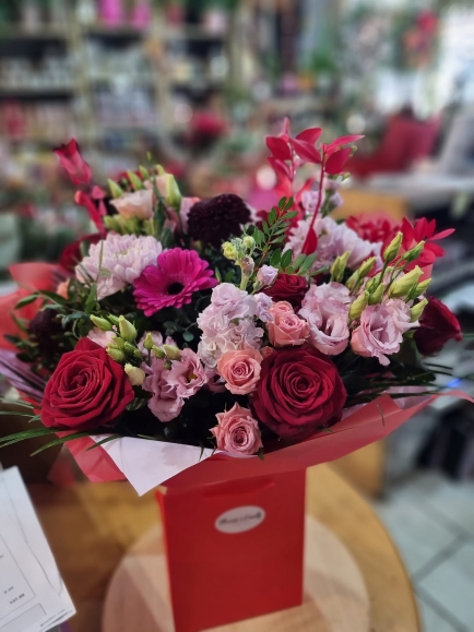 Bespoke made bouquet with reds and pinks, scented.
