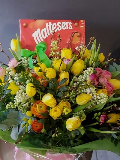 Yellow tulips bouquet with Maltesers arranged by local florist in Hayes, Bromley, Beckenham, West Wickham, Shirley, Cony Hall Keston