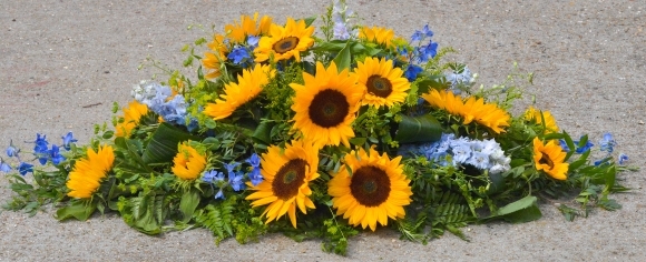 Sunflowers and Blue Delphinium Coffin Spray