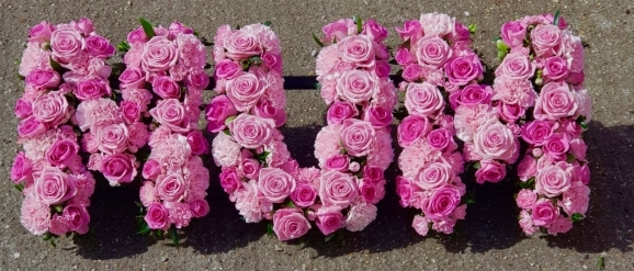 roses and carnation funeral letters made by funeral florist in Bromley