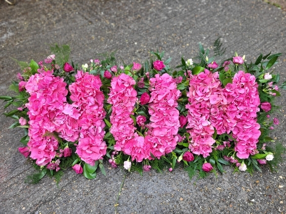 luxury looking funeral letters with hydrangea made by funeral florist in Bromley area