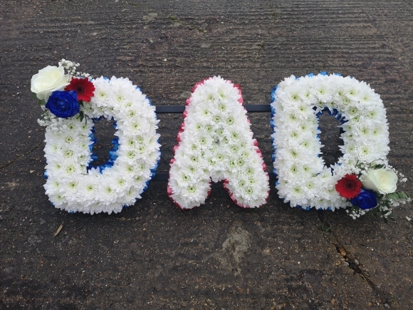 traditiona chrysnthemum massed funeral letters made by funeral florist in Bromley for free delivery in Bromley, Beckenham, Croydon, South London