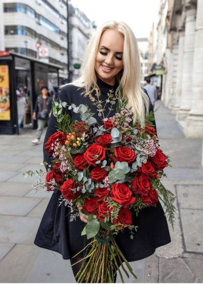 Stunning 24 red roses bouquet with fashionable fillers and foliages.  definitely gift to be remembered, by florist in London for delivery in BR CR SE6 SE12 SE9