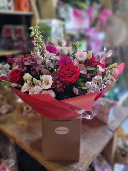 Bespoke made bouquet with reds and pinks, scented.