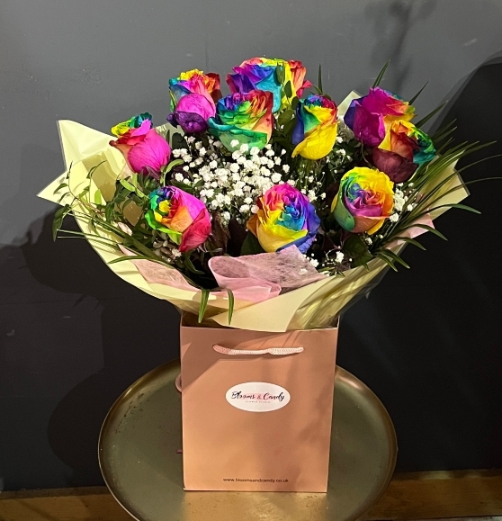 Stunning large heads of rainbow Roses bouquet dressed with some fillers and foliages. Made by florist near me in Bromley Beckenham Croydon Orpington Petts Wood Chislehurst 
