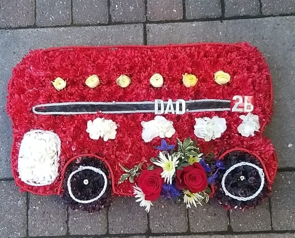 double decker funeral flowers bus