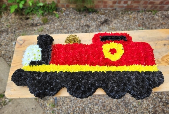2D steam train funeral flowers by Blooms and Candy Florist