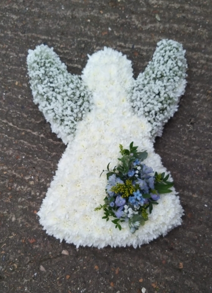 angel funeral tribute flowers made by Blooms and Candy Florist