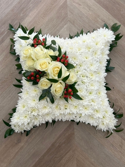 Classic chrysanthemum based funeral cushion. Colours os ribbon and sprays to be customised. by Blooms and Candy Florist