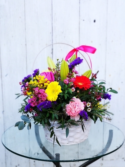 Basket arrangement for Mother's Day handmade by local florist in BR