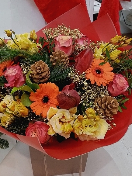 Orange and red fresh flowers bouquet handmade by florist in Bromley for same day delivery