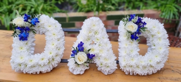 Chrysanthemum based DAD letters with white ribbon