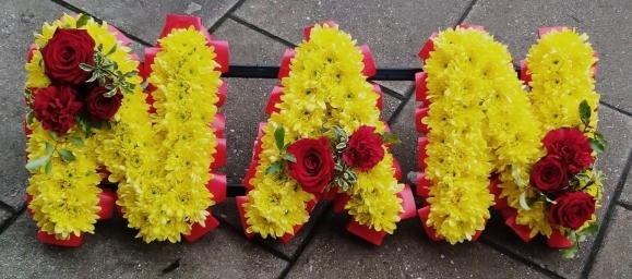 chrysnthemum based letters in yellow by funeral florist in Bromley, Croydon, Beckenham, South London