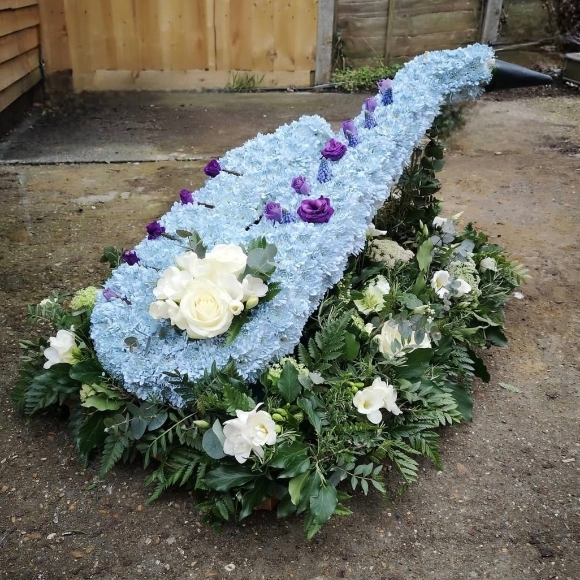 funeral flowers saxophone by Blooms and Candy Florist