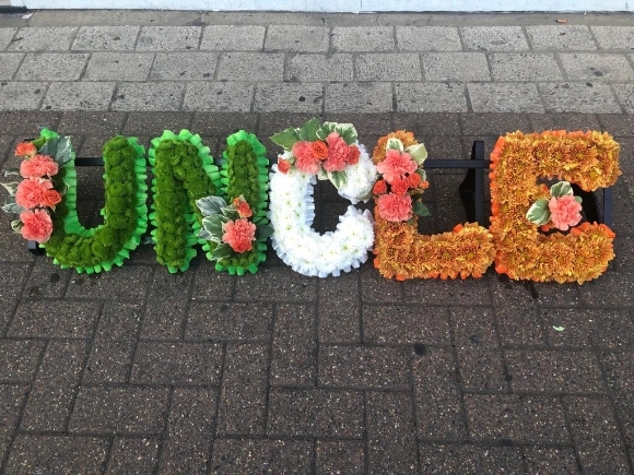 We can customised based letters to any national colours. When placing an order please specify what national flag is required and our designer florists will adjust theme to chosen letters. By funeral florist in Hayes, Bromley, Kent, UK