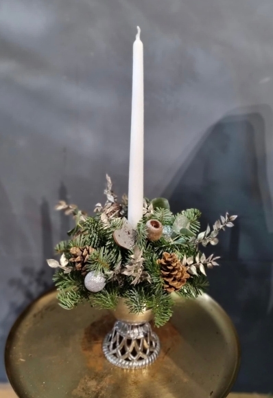Tall candle centerpiece made in silver glitter chalice for an elegant table display. This arrangement is around 50cm tall. Made by florist in Bromley, Kent, UK for guaranteed Christmas delivery in BR postcodes 