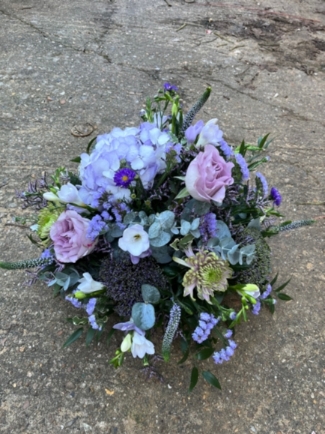 Stunning garden style lilacs and purples seasonal flowers posy made of best blooms. By florist in Bromley BR