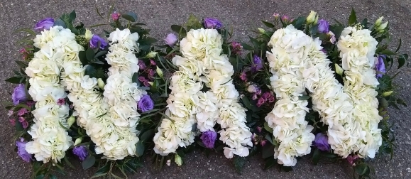 luxury looking funeral letters with hydrangea made by funeral florist in Bromley area