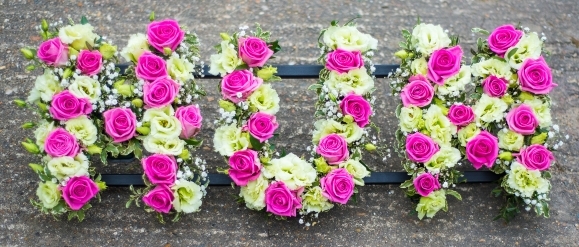 Gorgeous pink, creams and white mixed funeral letters made by funeral florist in Bromley for free delivery in Bromley, Beckenham, Croydon and South London