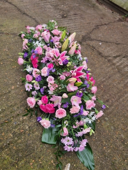 mixed pinks coffin spray by Blooms and Candy Florist from Bromley, Beckenham, Croydon