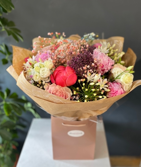 Seasonal luxury bouquet with pink peonies, allium, lisanthiusand gyp made by florist in Hayes, Bromley, Kent