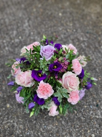 Florist choice pink and purple flowers posy to include roses and Lisanthius. By Blooms and Candy Florist