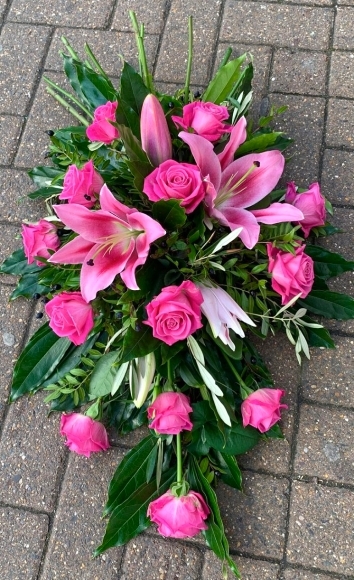 pink roses and pink lily teardrop spray made by florist in Bromley for funeral delivery in BR CR,  Kent