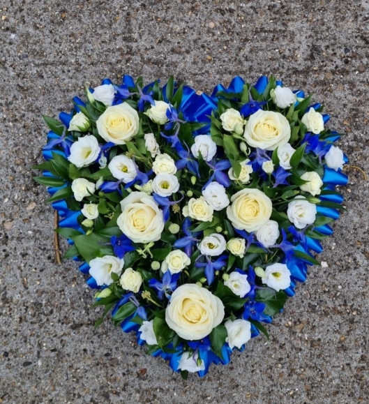 Mixed flowers solid heart with white and royal blue flowers, florist choice. by Blooms and Candy Florist