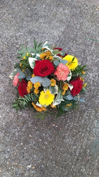 Bright funeral posy made by local florist in Bromley, Hayes for flower delivery in BR
