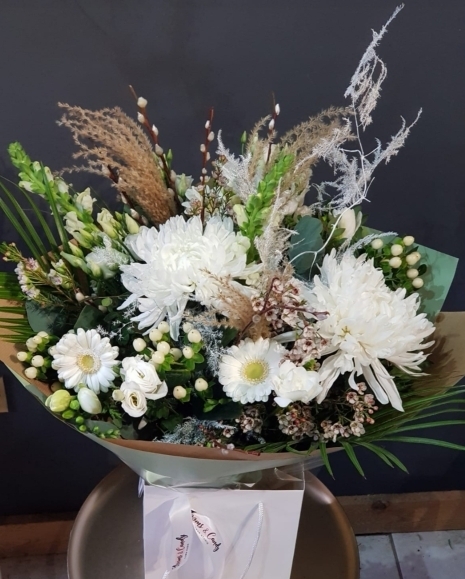 White bouquet to include blooms, berries, natural grasses, wax, eucalyptus arranged by florist in Bromley, kent