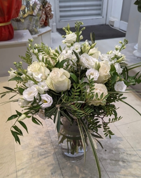 White sympathy flowers vase arrangement hand made by florist in Bromley, Kent