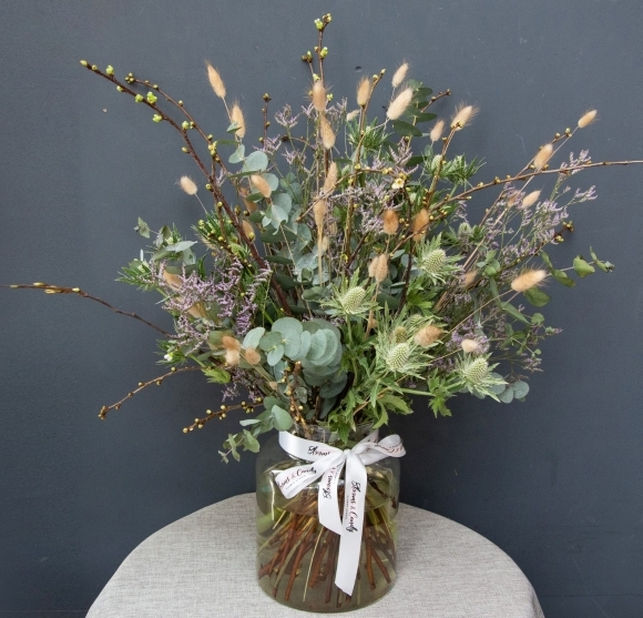 amazing mixed foliages and grasses vase made by florist in Bromley, Kent, UK